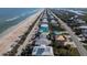 Beachfront homes and road view from above at 6110 S Atlantic Ave, New Smyrna Beach, FL 32169