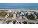 Aerial of beachfront homes showcasing ocean views at 6110 S Atlantic Ave, New Smyrna Beach, FL 32169