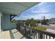 Private balcony overlooking the street and neighborhood at 6110 S Atlantic Ave, New Smyrna Beach, FL 32169