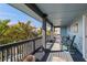 Private balcony overlooking ocean and tropical landscape at 6110 S Atlantic Ave, New Smyrna Beach, FL 32169