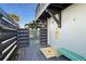 Outdoor shower with wood accents and bench at 6110 S Atlantic Ave, New Smyrna Beach, FL 32169