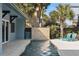 Relaxing pool area with patio and tropical landscaping at 6110 S Atlantic Ave, New Smyrna Beach, FL 32169