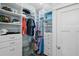 Large walk-in closet with ample shelving and hanging space at 6110 S Atlantic Ave, New Smyrna Beach, FL 32169