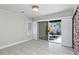 Common area with sliding doors leading to the backyard at 6111 Turtlemound Rd, New Smyrna Beach, FL 32169