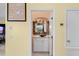 Stylish powder room with unique sink and mirror at 6111 Turtlemound Rd, New Smyrna Beach, FL 32169