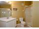 Updated bathroom with shower, toilet, and vanity with white cabinets at 6240 Contessa Dr # 101, Orlando, FL 32829