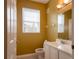 Small bathroom with white vanity and toilet at 6240 Contessa Dr # 101, Orlando, FL 32829