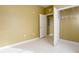 Bedroom with closet and access to hall at 6240 Contessa Dr # 101, Orlando, FL 32829