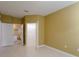 Bedroom with access to bathroom and walk-in closet at 6240 Contessa Dr # 101, Orlando, FL 32829