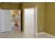 Bedroom with bathroom and walk-in closet access at 6240 Contessa Dr # 101, Orlando, FL 32829