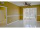 Spacious bedroom with tile floors and sliding glass doors to patio at 6240 Contessa Dr # 101, Orlando, FL 32829