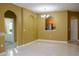 Bright dining area with tile floors and kitchen pass-through at 6240 Contessa Dr # 101, Orlando, FL 32829