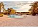 Community pool with plenty of lounge chairs at 6240 Contessa Dr # 101, Orlando, FL 32829