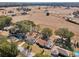 Aerial view of home on quiet street, showcasing surrounding area and neighborhood at 6616 Nw 60Th St, Ocala, FL 34482