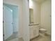 Small bathroom with toilet and single vanity at 6946 Audobon Osprey Cv, Harmony, FL 34773