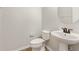 Small bathroom with pedestal sink and toilet at 7525 Azalea Cove Cir, Orlando, FL 32807