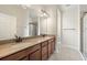 Double vanity bathroom with granite countertop at 7525 Azalea Cove Cir, Orlando, FL 32807