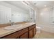 Clean bathroom with double vanity, shower, and tub at 7525 Azalea Cove Cir, Orlando, FL 32807