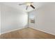 Bright bedroom featuring light walls and wood-look flooring at 7525 Azalea Cove Cir, Orlando, FL 32807