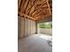 Unfinished interior featuring concrete flooring, block walls, and exposed wood beams, ready for customization at 785 N Phelps Ave, Winter Park, FL 32789