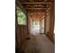 Spacious interior with concrete flooring, block walls, and wood frame construction, awaiting transformation at 785 N Phelps Ave, Winter Park, FL 32789