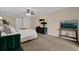 Spacious bedroom featuring neutral tones and a ceiling fan for added comfort at 8620 Willow Kane Ct, Orlando, FL 32835