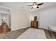 Bedroom with a decorative rug, crib, and closet at 8620 Willow Kane Ct, Orlando, FL 32835