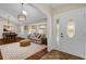 Inviting entryway showcases a view into the living room and dining area, with bright natural light at 8620 Willow Kane Ct, Orlando, FL 32835