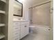 Clean bathroom with white vanity and a tub shower combination at 90 Moree Loop # 16, Winter Springs, FL 32708