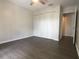 Bedroom with wood-look floors and large closet at 90 Moree Loop # 16, Winter Springs, FL 32708