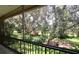 Screened lanai overlooking lush green landscape at 90 Moree Loop # 16, Winter Springs, FL 32708