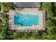 Aerial view of a community pool with surrounding lounge chairs at 936 Parc Hill Blvd, Orange City, FL 32763