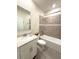 Clean bathroom, featuring a bathtub, toilet and vanity with a quartz countertop at 9884 Red Eagle Dr, Orlando, FL 32825