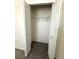 Standard closet with wire shelving and neutral carpet at 9884 Red Eagle Dr, Orlando, FL 32825