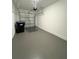 Garage with automatic opener and epoxy flooring at 9884 Red Eagle Dr, Orlando, FL 32825