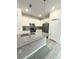 Modern kitchen with an island and stainless steel appliances at 9884 Red Eagle Dr, Orlando, FL 32825