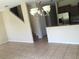 Spacious dining area with tile floors and kitchen access at 10975 Savannah Landing Cir, Orlando, FL 32832