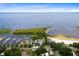 Aerial view of waterfront community with marina and beach at 1114 Wyoming Ave, St Cloud, FL 34769