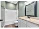 Clean bathroom with granite countertop and shower/tub combo at 1114 Wyoming Ave, St Cloud, FL 34769