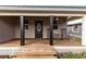 Inviting front porch with rocking chairs, perfect for relaxing at 1114 Wyoming Ave, St Cloud, FL 34769