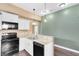 Kitchen features granite countertops and a double sink at 1114 Wyoming Ave, St Cloud, FL 34769