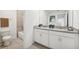 Bathroom with double vanity, granite countertop and bathtub at 1200 White Ash Loop, Deland, FL 32720