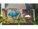 Aerial view of a home with a screened pool at 1210 Kenway Ave, Deltona, FL 32738