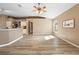 Living room features hardwood floors and ceiling fan at 1210 Kenway Ave, Deltona, FL 32738