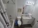 Clean bathroom, granite countertop, white cabinets, and a shower/tub combo at 1230 Las Fuentes Dr, Kissimmee, FL 34746