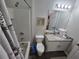 Cozy bathroom with a shower-tub combination, single sink vanity, and tiled floor at 1230 Las Fuentes Dr, Kissimmee, FL 34746