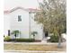 Charming two-story home with well-maintained landscaping and a red tile roof at 1230 Las Fuentes Dr, Kissimmee, FL 34746