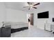 Spacious bedroom with tile floors and a ceiling fan at 1267 Varnado Rd, Groveland, FL 34736