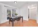 Dining area with table and chairs near sliding doors at 1267 Varnado Rd, Groveland, FL 34736