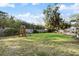 Large backyard with playset and fenced area at 128 Tildenville School Rd, Winter Garden, FL 34787